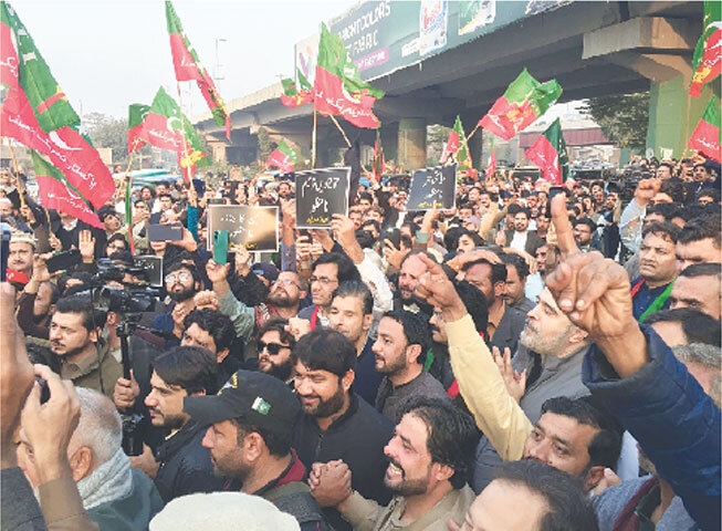 PTI workers protest against the 27th Amendment outside the KP Assembly building.&mdash;Shahbaz Butt / White Star