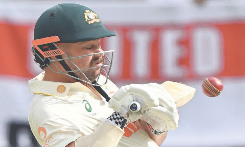 Australian opener Travis Head hits a six during the first Ashes Test against England at the Perth Stadium on Saturday.&mdash;AFP