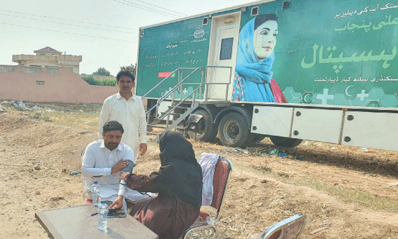 A field hospital is parked in a remote village of Gujar Khan.