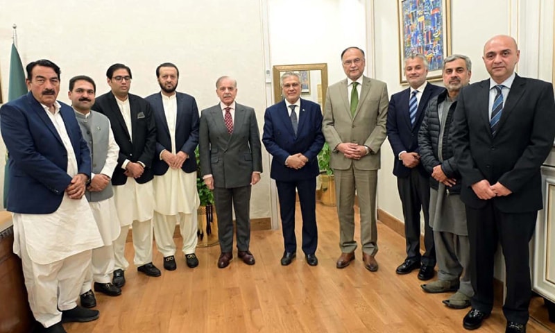 PM Shehbaz Sharif in a group photo with newly elected members of the National Assembly. &mdash;PPI