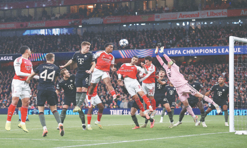 LONDON: Arsenal&rsquo;s Jurrien Timber (C) heads to score past Bayern Munich goalkeeper Manuel Neuer during their Champions League match at the Emirates Stadium.&mdash;Reuters