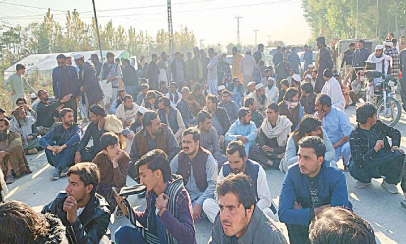 Protesters block a road in Bajaur on Friday against the attack on lawmaker’s house. — Dawn Protesters block a road in Bajaur on Friday against the attack on lawmaker’s house. — Dawn