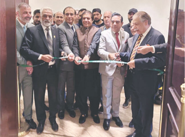 Railways Minister Mohammad Hanif Abbasi inaugurates the Munawar Mughal Conference Hall at Islamabad Chamber of Commerce and Industry on Saturday. — APP
