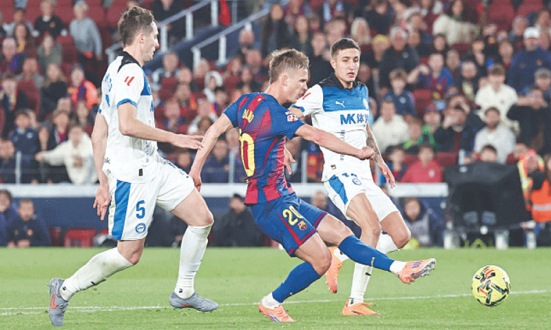 BARCELONA&rsquo;S Daniel Olmo shoots to score against Deportivo Alaves during their La Liga match at Camp Nou on Saturday.&mdash;AFP