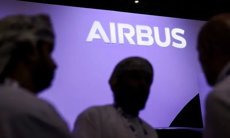 Attendees stand next to a display by Airbus at the Dubai Airshow, in Dubai, United Arab Emirates, November 17, 2025. &mdash;Reuters/File
