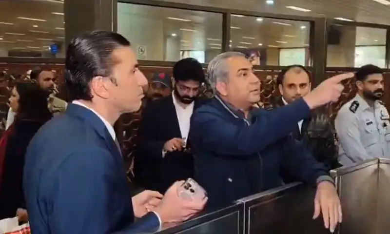 Interior Minister Mohsin Naqvi observes immigration processes at Lahore Airport on December 2. &mdash; screengrab via PTVNewsOfficial/X