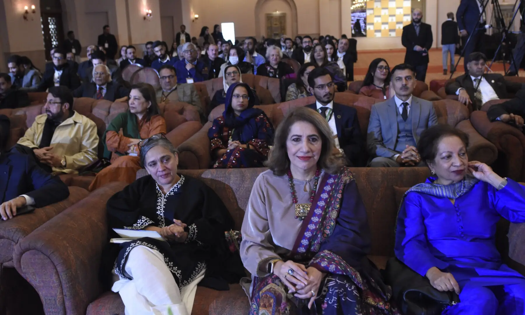 Audience listens intently as speakers discuss population crisis at the summit. — Tanveer Shahzad / White Star