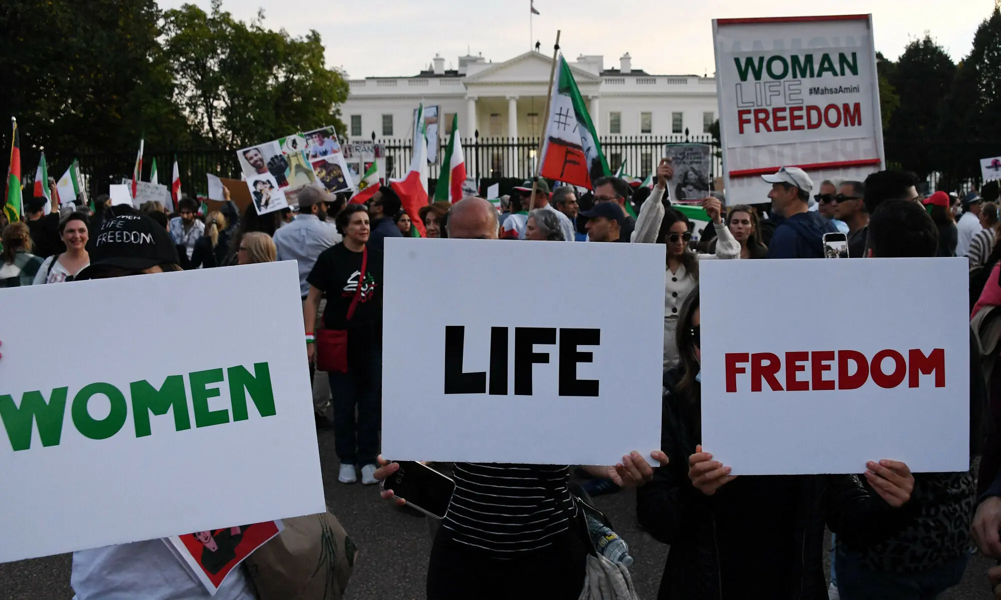Protesters march in solidarity with protesters in Iran in front of the White House in Washington, DC in 2022. &mdash; AFP