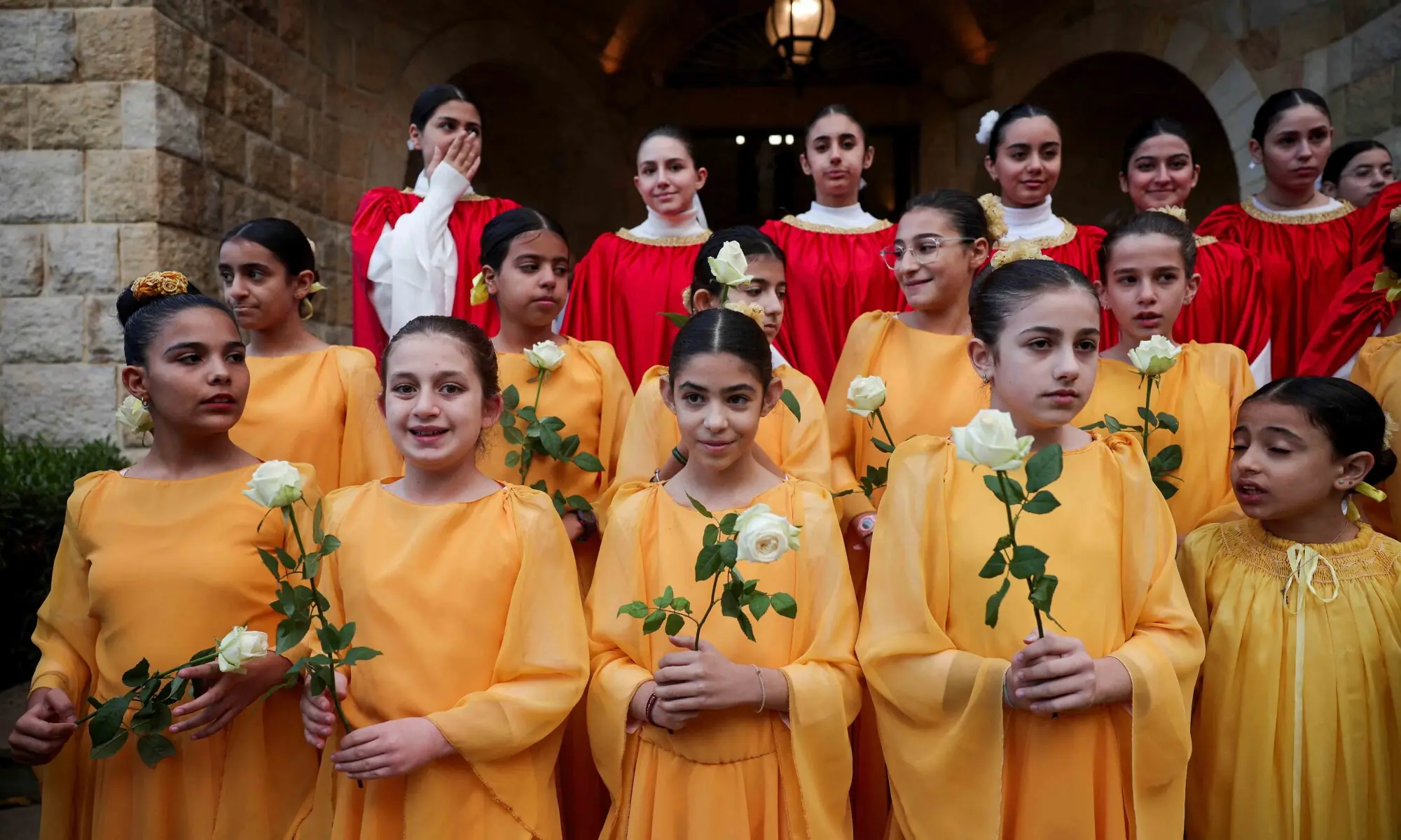 CHILDREN prepare to welcome Pope Leo XIV during his visit to the De La Croix Psychiatric Hospital in Jal El Dib, Lebanon. &mdash; Reuters