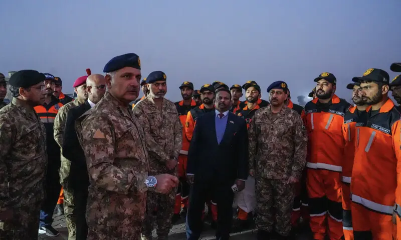 NDMA Chairman Lt Gen Inam Haider Malik photographed alongside an urban search and rescue team being dispatched from Islamabad to Sri Lanka on Dec 3. &mdash; TariqFazal Chaudhry/X