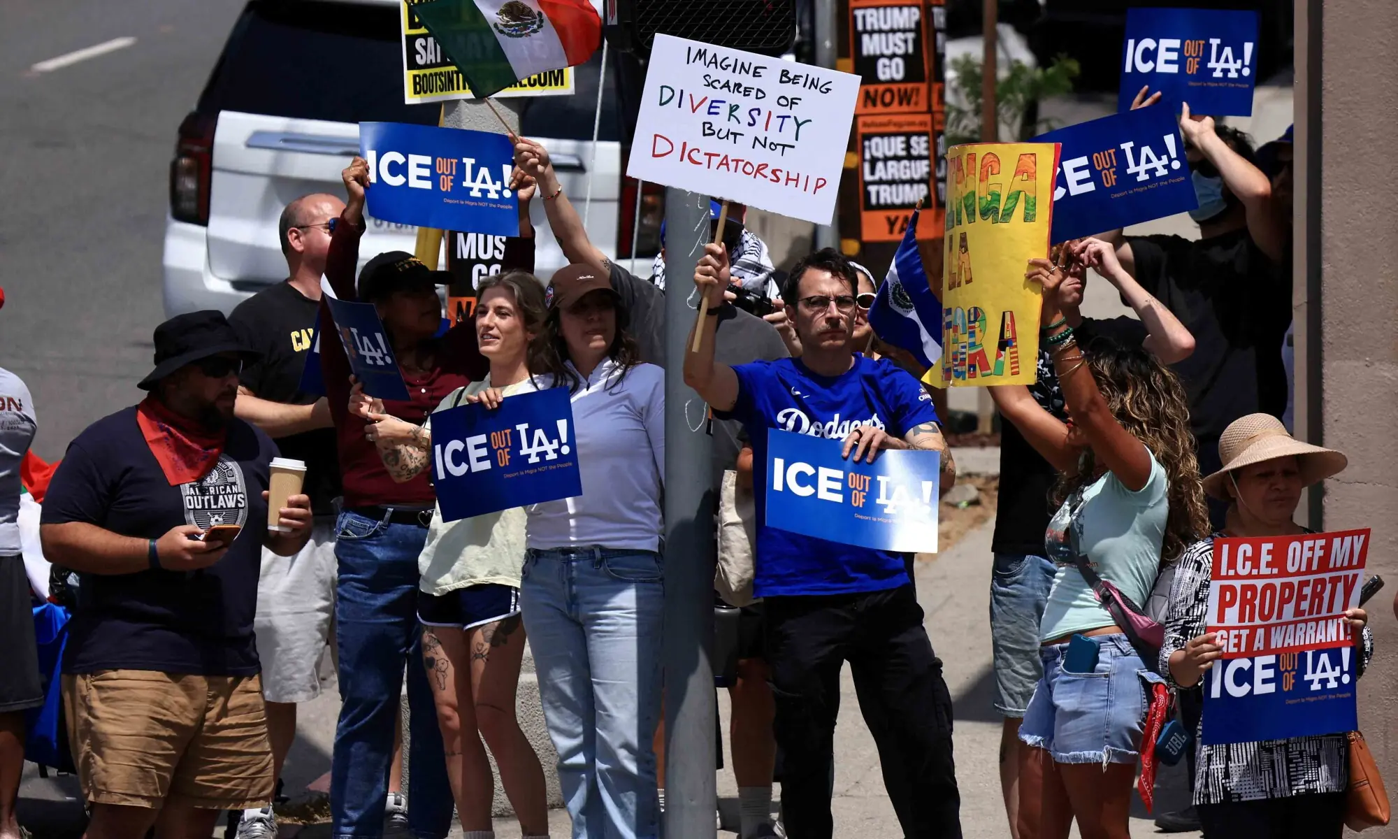 Dodgers fans protest against the US Immigration and Customs Enforcement (ICE) and federal immigration sweeps near the Dodgers Stadium in Los Angeles, California, US on June 21, 2025. &mdash; Reuters