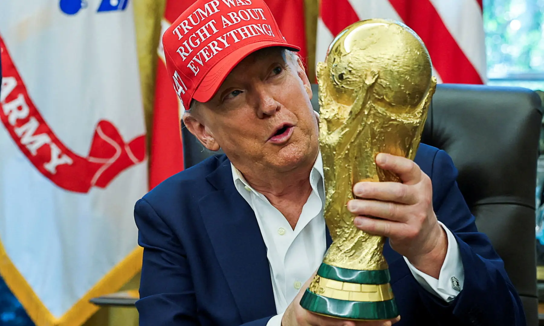 US President Donald Trump wears a &lsquo;Trump Was Right About Everything!&rsquo; hat while holding the FIFA World Cup Trophy, as he makes an announcement on the 2026 FIFA World Cup, in the Oval Office at the White House in Washington, DC, US, August 22, 2025. &mdash; Reuters/File