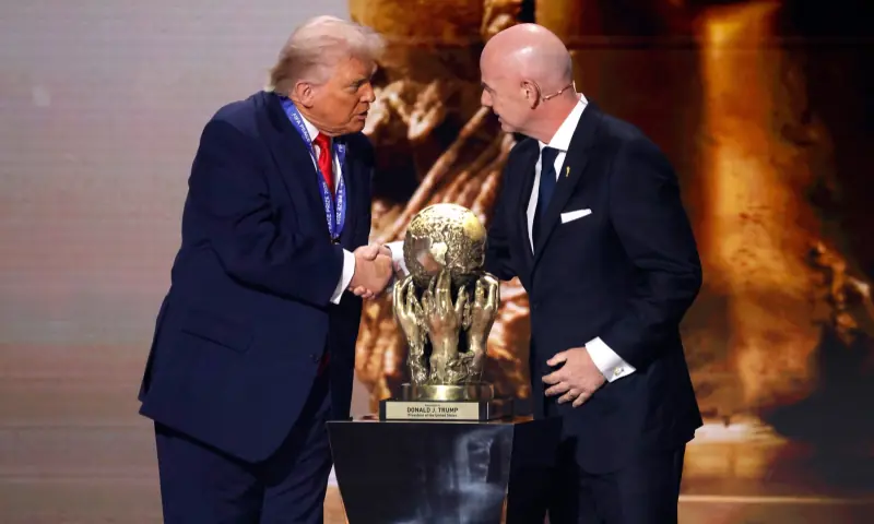 FIFA president Gianni Infantino presents United States president Donald Trump with the FIFA Peace Prize during the FIFA World Cup 2026 Final Draw at John F. Kennedy Centre for the Performing Arts Dec 5, 2025 in Washington, District of Columbia, USA. &mdash; Reuters