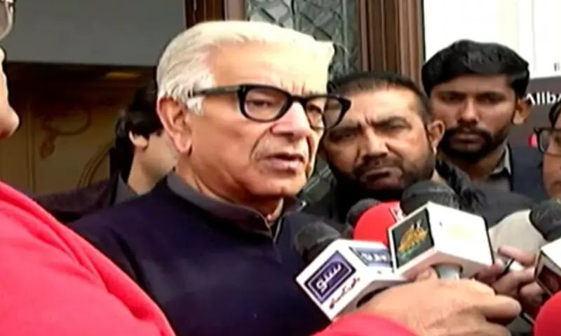 Defence Minister Khawaja Asif speaks to the media in Sialkot on December 6. &mdash; DawnNewsTV