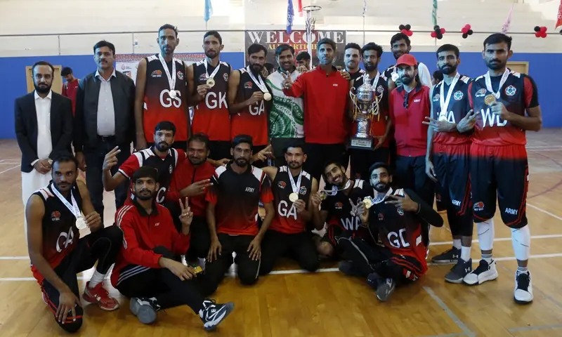 Team army pose with their gold medals after defeating Navy 29-26 to win the men&rsquo;s netball final on Sunday at the PSB National  Coaching Centre. &mdash; Photo via Tahir Jamal