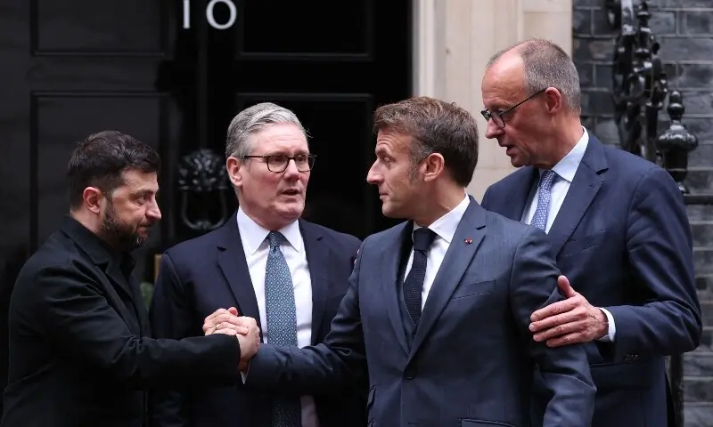 Ukraine’s President Volodymyr Zelensky, Britain’s Prime Minister Keir Starmer, France’s President Emmanuel Macron and Germany’s Chancellor Friedrich Merz chat on the 10 Downing Street doorstep after a meeting in central London on December 8. —AFP Ukraine’s President Volodymyr Zelensky, Britain’s Prime Minister Keir Starmer, France’s President Emmanuel Macron and Germany’s Chancellor Friedrich Merz chat on the 10 Downing Street doorstep after a meeting in central London on December 8. —AFP