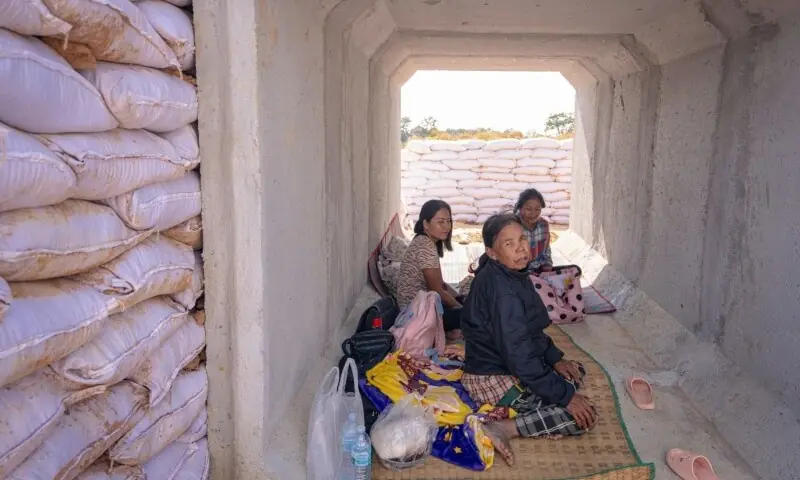  Residents take shelter in a bunker following clashes along the Thai-Cambodia border in Thailand&rsquo;s Sa Kaeo Province on December 9. &mdash; AFP 