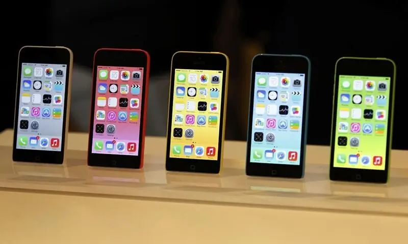 A file photo of mobile phones lined up on display. &mdash; AFP/File