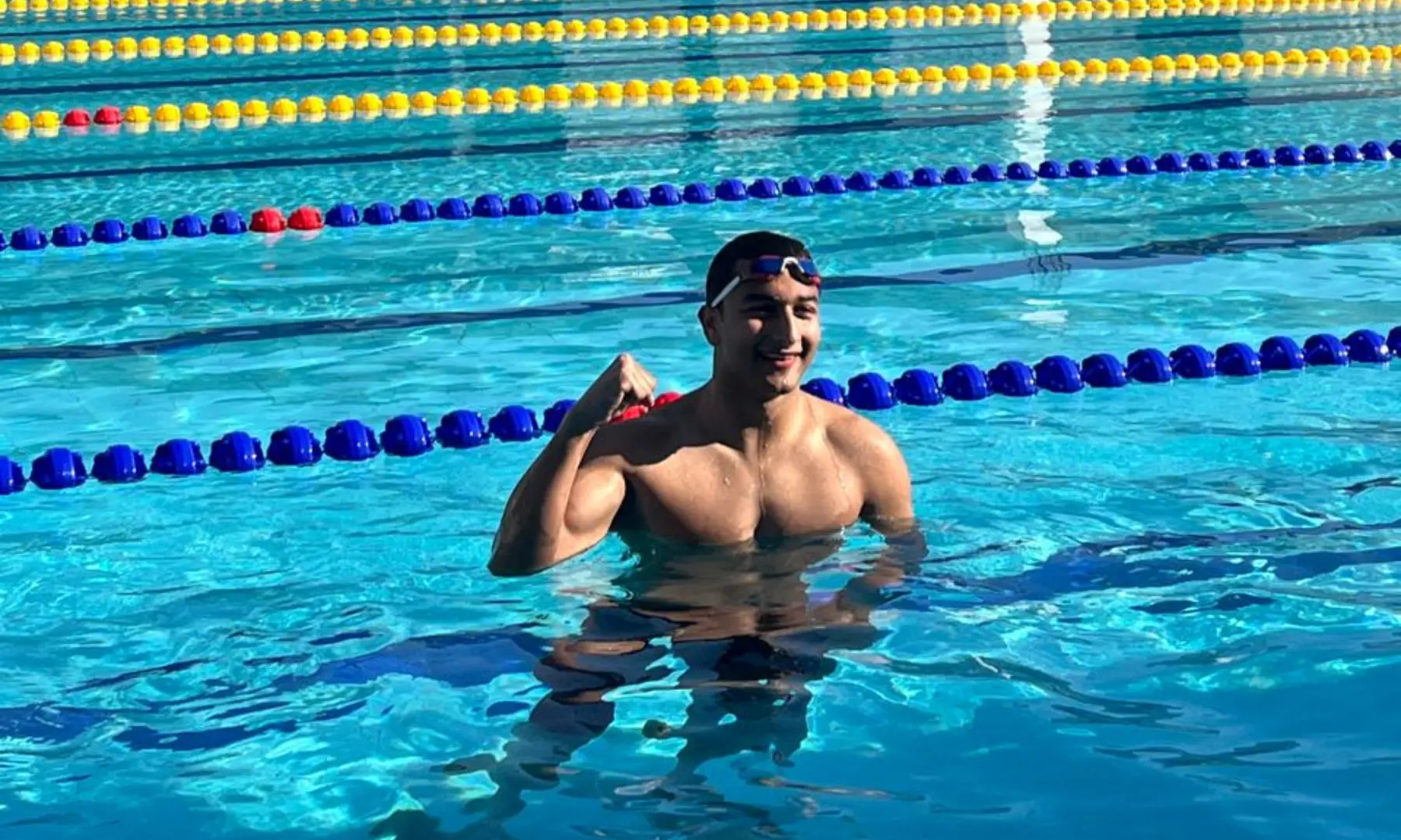 Hamza Asif poses for a photograph at the KMC Swimming Pool on Wednesday during the ongoing 35th National Games in Karachi.  &mdash; Photo by author