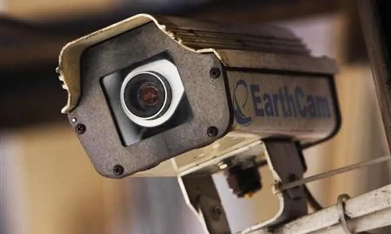 This image shows a close-up of a security CCTV camera used for surveillance. &mdash;Reuters/File