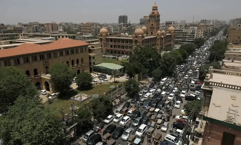 A general view of a road traffic and the Karachi Metropolitan Corporation (KMC) building in the background, in Karachi on May 11, 2020. — Reuters/File A general view of a road traffic and the Karachi Metropolitan Corporation (KMC) building in the background, in Karachi on May 11, 2020. — Reuters/File