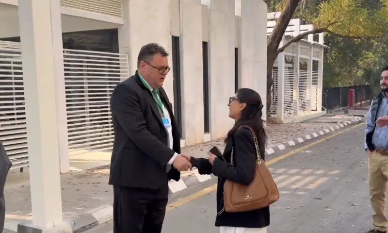Norwegian Ambassador Per Albert Ilsaas meets lawyer Imaan Zainab Mazari-Hazir outside the Supreme Court on Thursday. &mdash; screengrab
