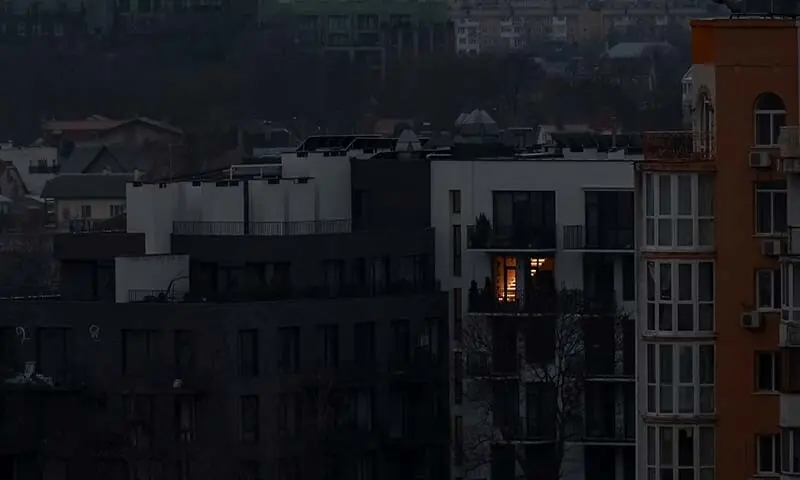 Residential buildings during a power blackout after critical civil infrastructure was hit by recent Russian missile and drone attacks, amid the Russia-Ukraine war, in Odessa, Ukraine on December 14. — Reuters