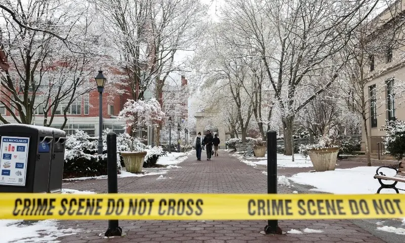 Students walk on campus following a shooting at Brown University, in Providence, Rhode Island, US, on December 14. &mdash; Reuters