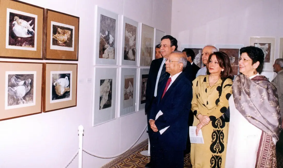   Shaukat Tarin (left) and Ishrat Husain (centre) at the Mohatta Palace Museum&rsquo;s Jamil Naqsh exhibit. Photo: Mohatta Palace Museum  