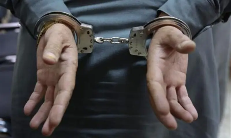 A file photo of a person in handcuffs — Reuters/File A file photo of a person in handcuffs — Reuters/File