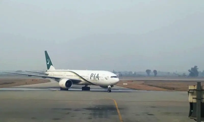 In this file photo, a Pakistan International Airlines aircraft is pictured on the runway at Sialkot International Airport. &mdash; Photo provided by Abid Hussain Mehdi/File