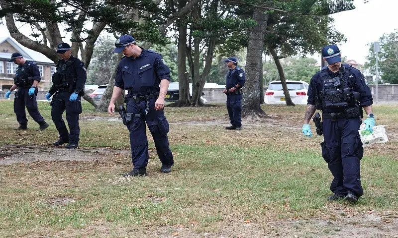 The police search for evidence around the area where the Bondi Beach shooting took place in Sydney on December 16, 2025. &mdash; AFP