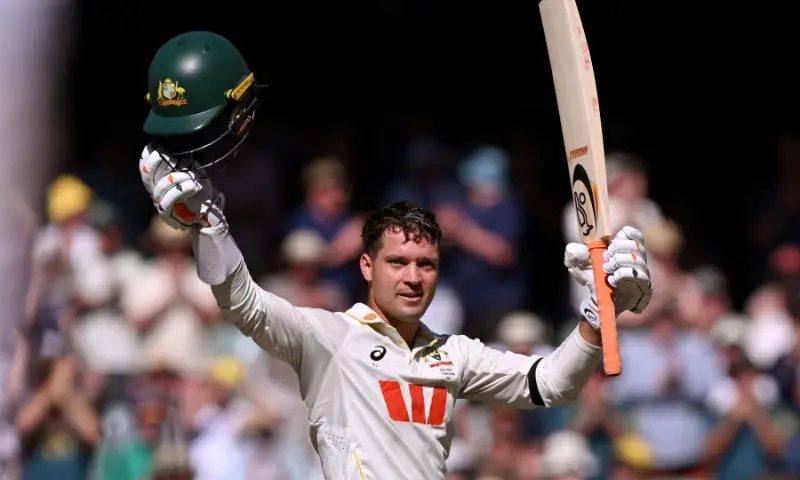 Australian batsman Alex Carey celebrates scoring a century on the first day of the third Ashes cricket Test match between Australia and England at the Adelaide Oval in Adelaide on December 17, 2025. &mdash; AFP
