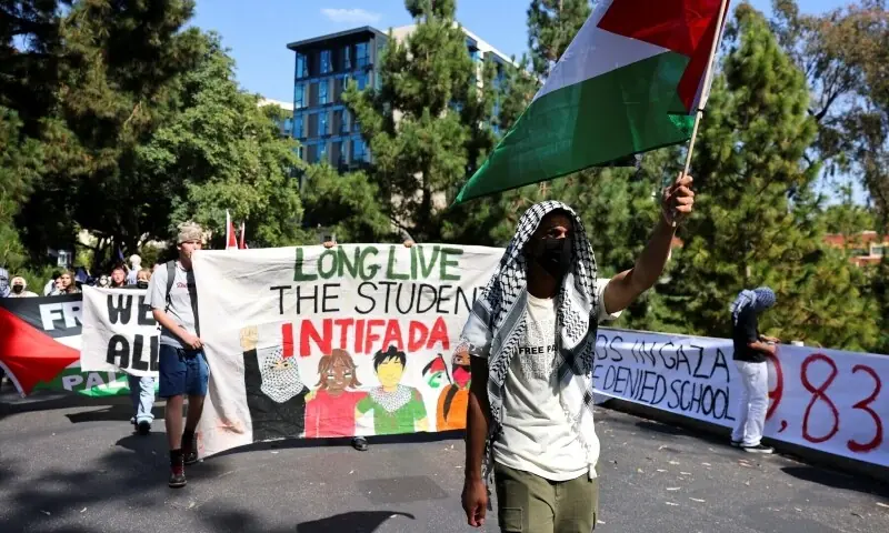 A man carries a Palestinian flag, as students walkout of classes in what they call “one year of genocide on the people of Gaza”, as they demonstrate at the University of California, in Irvine, California, US on Oct 7, 2024. — Reuters/File A man carries a Palestinian flag, as students walkout of classes in what they call “one year of genocide on the people of Gaza”, as they demonstrate at the University of California, in Irvine, California, US on Oct 7, 2024. — Reuters/File