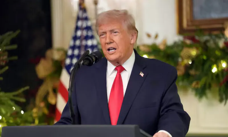 US President Donald Trump delivers an address to the nation from the Diplomatic Reception Room of the White House in Washington, DC, on December 17. &mdash; Reuters