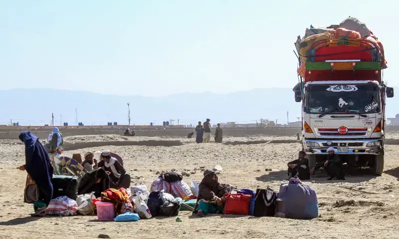 Afghan refugees along with their belongings await deportation to Afghanistan near the Pakistan-Afghanistan border in Chaman on October 29, 2025. — AFP Afghan refugees along with their belongings await deportation to Afghanistan near the Pakistan-Afghanistan border in Chaman on October 29, 2025. — AFP