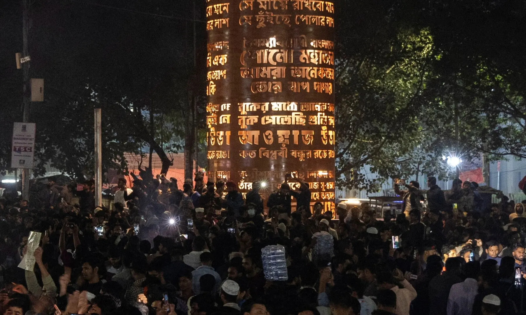 People gather following the death of Sharif Osman Hadi, a student leader who had been receiving treatment in Singapore after being shot in the head, in Dhaka, Bangladesh, December 18, 2025. &mdash; Reuters