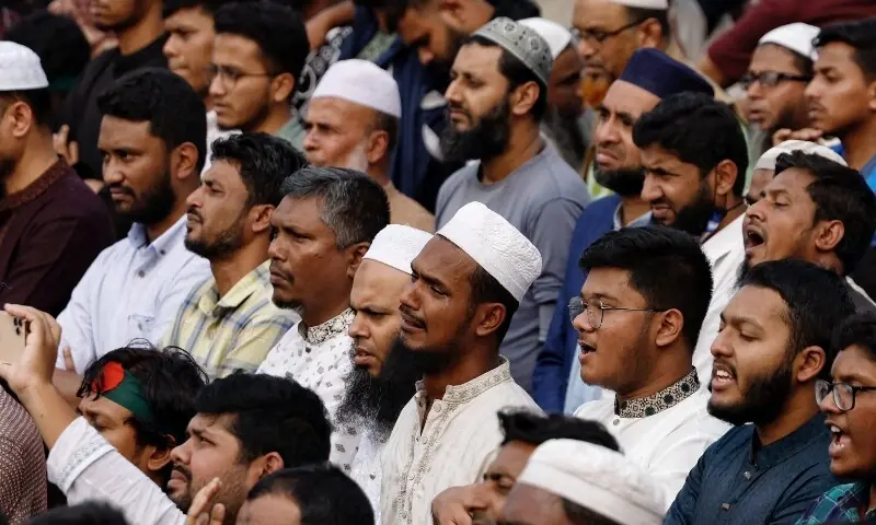 People mourn as they join the funeral prayer for Sharif Osman Hadi, a student leader, who died after being shot in the head, at the Parliament building area of Manik Mia Avenue, in Dhaka, Bangladesh, on December 20. &mdash; Reuters