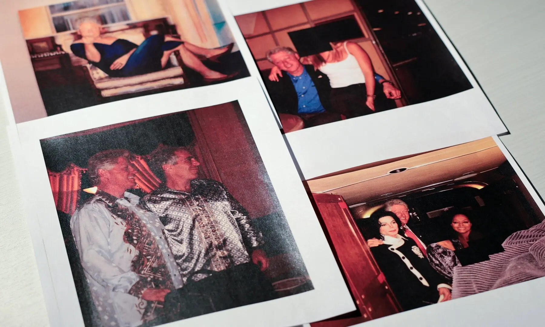 Newly-released documents from late financier and sex offender Jeffrey Epstein, including a number of pictures of former US President Bill Clinton and a photo of a painting depicting Clinton in a blue dress, are seen in these handout images released by the U.S. Justice Department and printed and arranged for a photograph by Reuters in Washington, DC, US on December 19, 2025. &mdash;Reuters