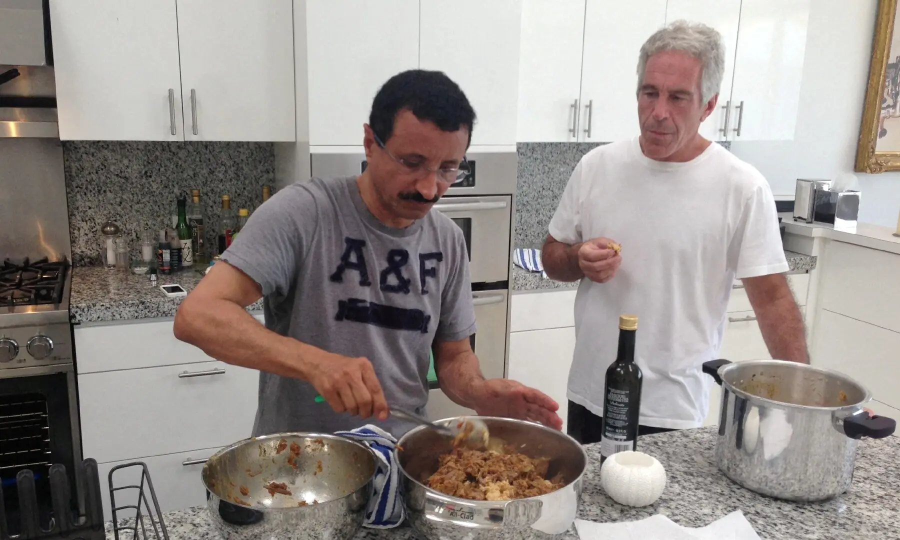 Late financier and convicted sex offender Jeffrey Epstein and Sultan Ahmed bin Sulayem, Emirati businessman and Chairman and Group CEO of DP World, are seen in this undated handout image from the Epstein estate released by Democrats on the House Oversight Committee in Washington, DC, US, on December 18, 2025. &mdash;Reuters