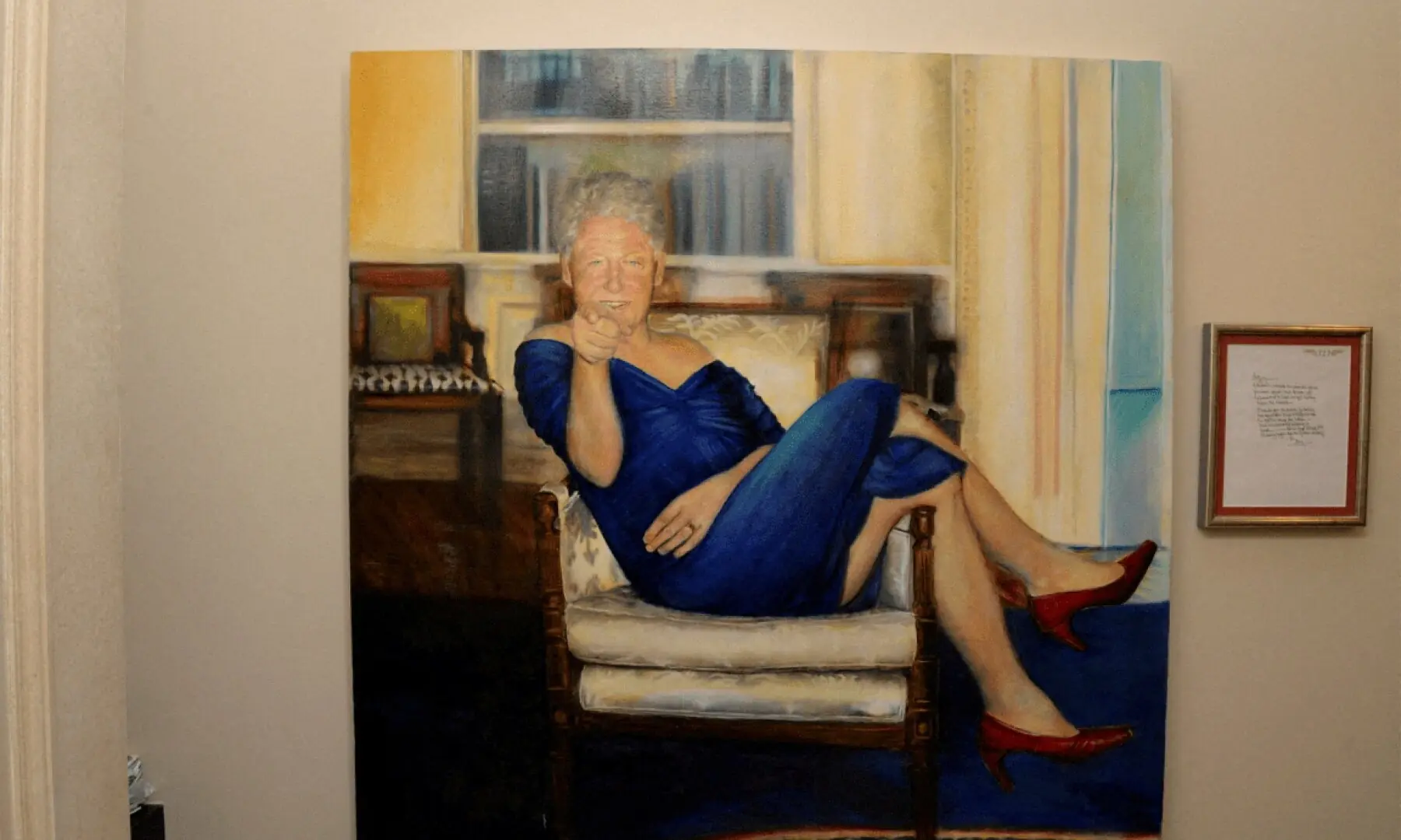 A painting of former US President Bill Clinton wearing a dress is displayed inside the Manhattan home of Jeffrey Epstein in this image from the estate of late financier and convicted sex offender Jeffrey Epstein, released by the Department of Justice in Washington, DC, US, on December 19, 2025.&mdash;Reuters