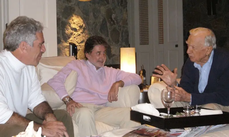 Former CBS news anchor Walter Cronkite speaks with late financier and convicted sex offender Jeffrey Epstein in an undated photograph released by the Department of Justice in Washington, DC, US on December 19, 2025. &mdash; Reuters/File