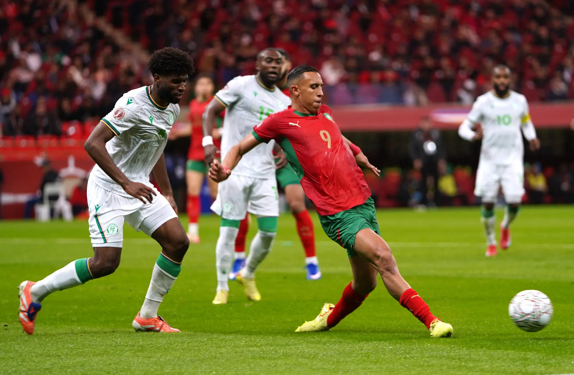 Morocco&rsquo;s Soufiane Rahimi in action with Comoros&rsquo; Kenan Toibibou during the Africa Cup of Nations at the Prince Moulay Abdellah Stadium in Rabat, Morocco on December 21, 2025. &mdash; Reuters
