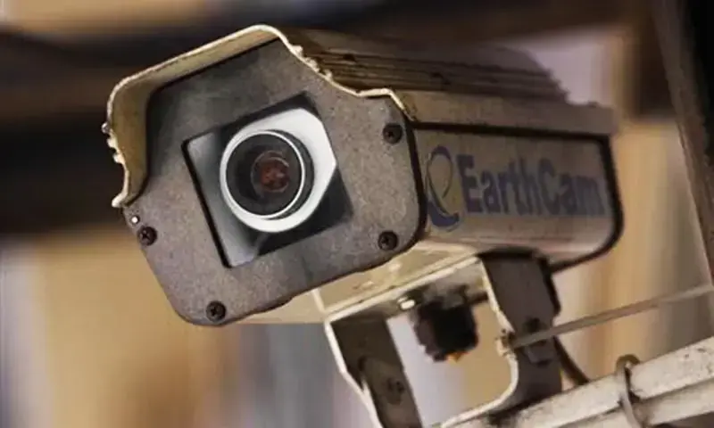 This image shows a close-up of a security CCTV camera used for surveillance. &mdash;Reuters/File