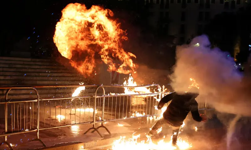 A supporter of the opposition is burned by a Molotov cocktail during an anti-government protest in Tirana, Albania, December 22, 2025. - REUTERS A supporter of the opposition is burned by a Molotov cocktail during an anti-government protest in Tirana, Albania, December 22, 2025. - REUTERS