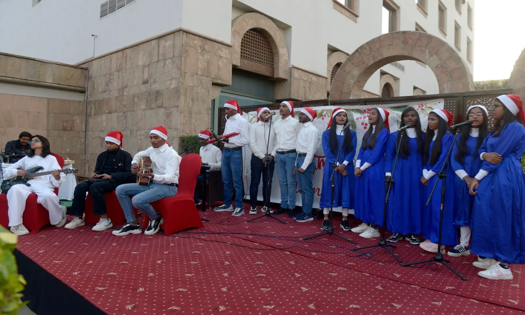 Choir sings carols at the Christmas Charity Market organised by the German embassy in Islamabad. &mdash;Mohammad Asim /White Star