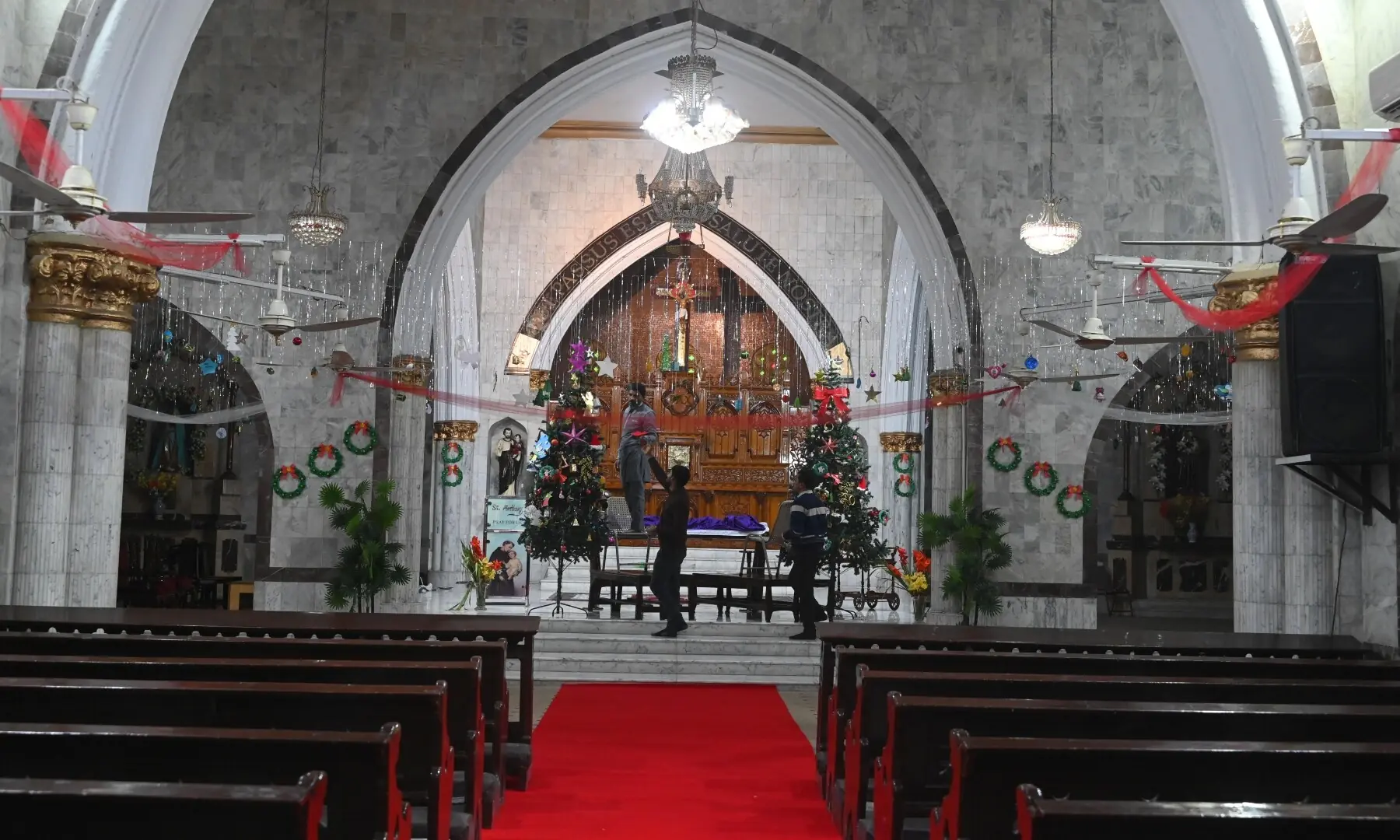 Christian devotees decorating the Saint Anthony&rsquo;s Church in Lahore ahead of Christmas. &mdash; Arif Ali/ White Stars