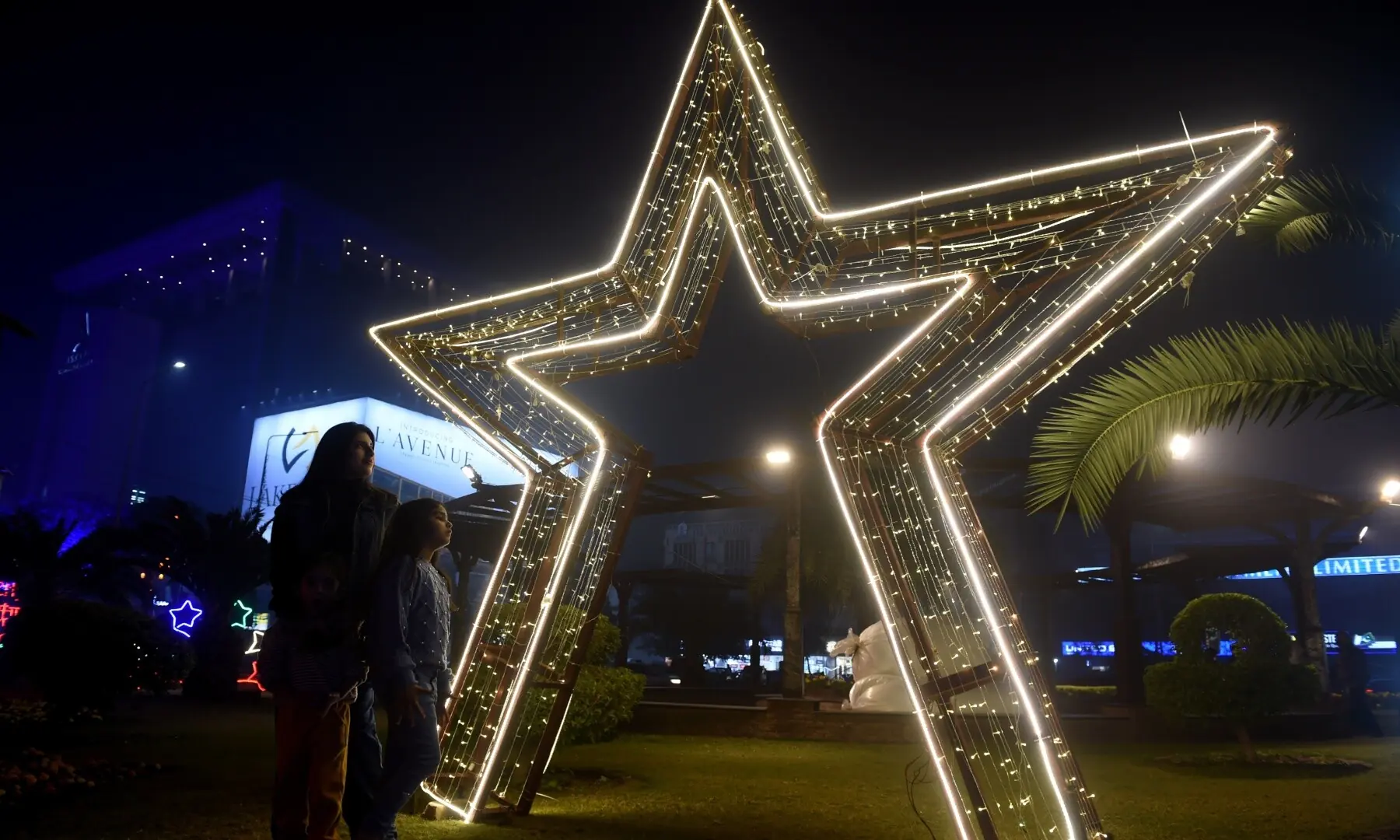 Illuminated view of Lahore&rsquo;s Liberty Ground, decorated for Christmas Eve celebrations. &mdash;  Murtaza Ali/ White Star
