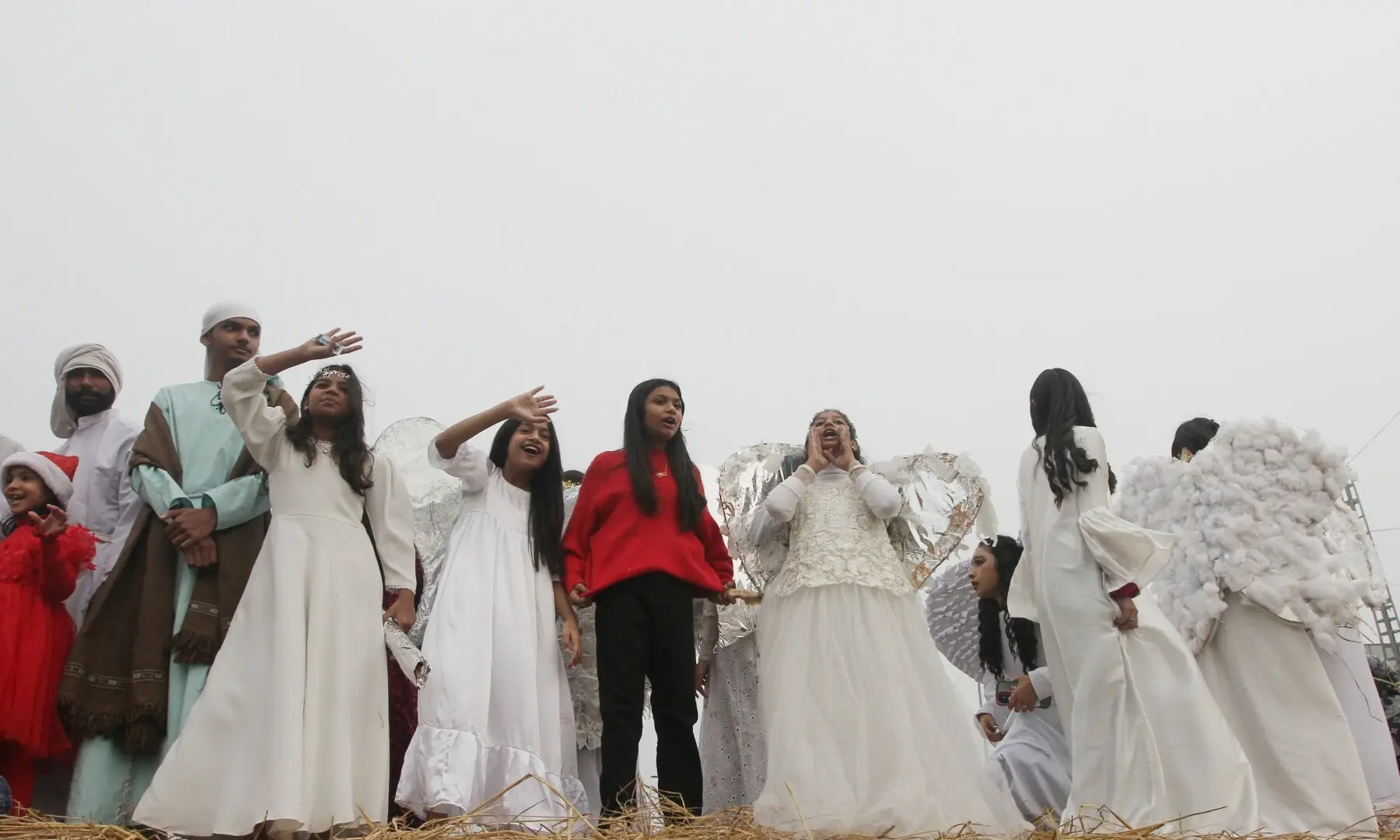 People take part in a Christmas rally at center point near Liberty Market, Lahore. &mdash;  Murtaza Ali/ White Star