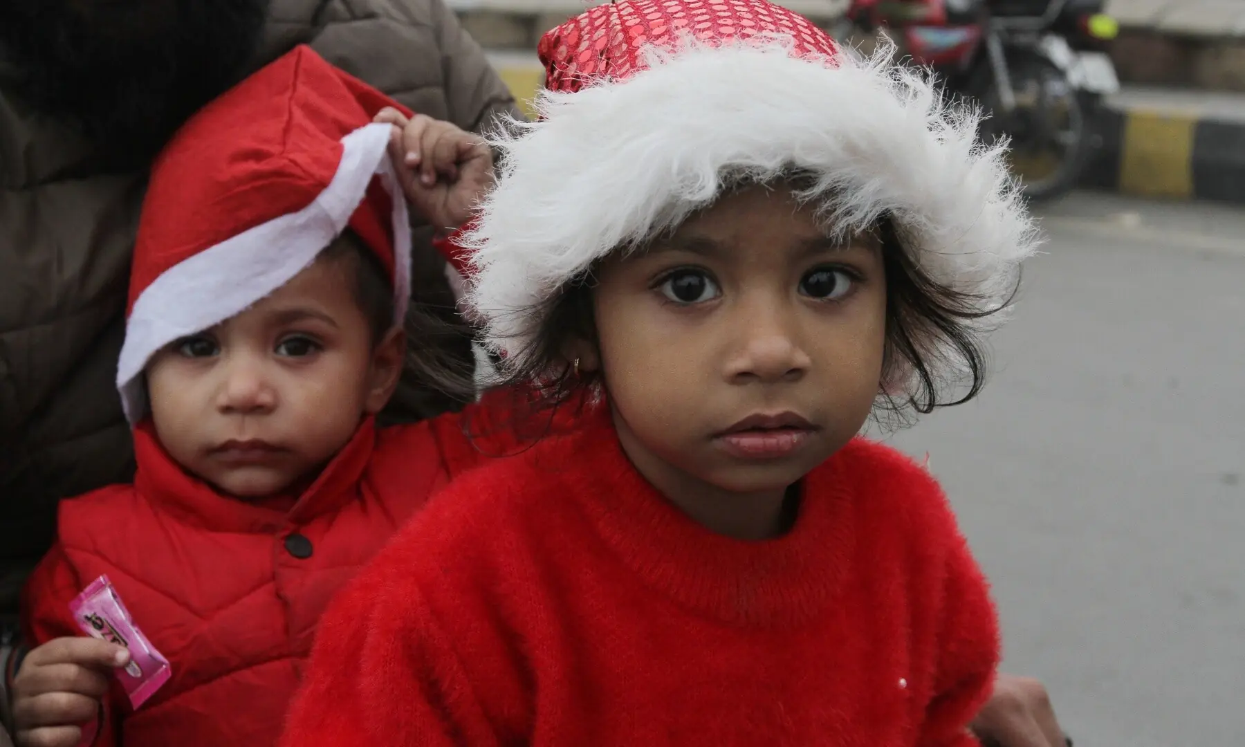 Children dressed up in their favorite Santa costume during a Christmas rally at center point near Liberty Market, Lahore. &mdash;  Murtaza Ali/ White Star
